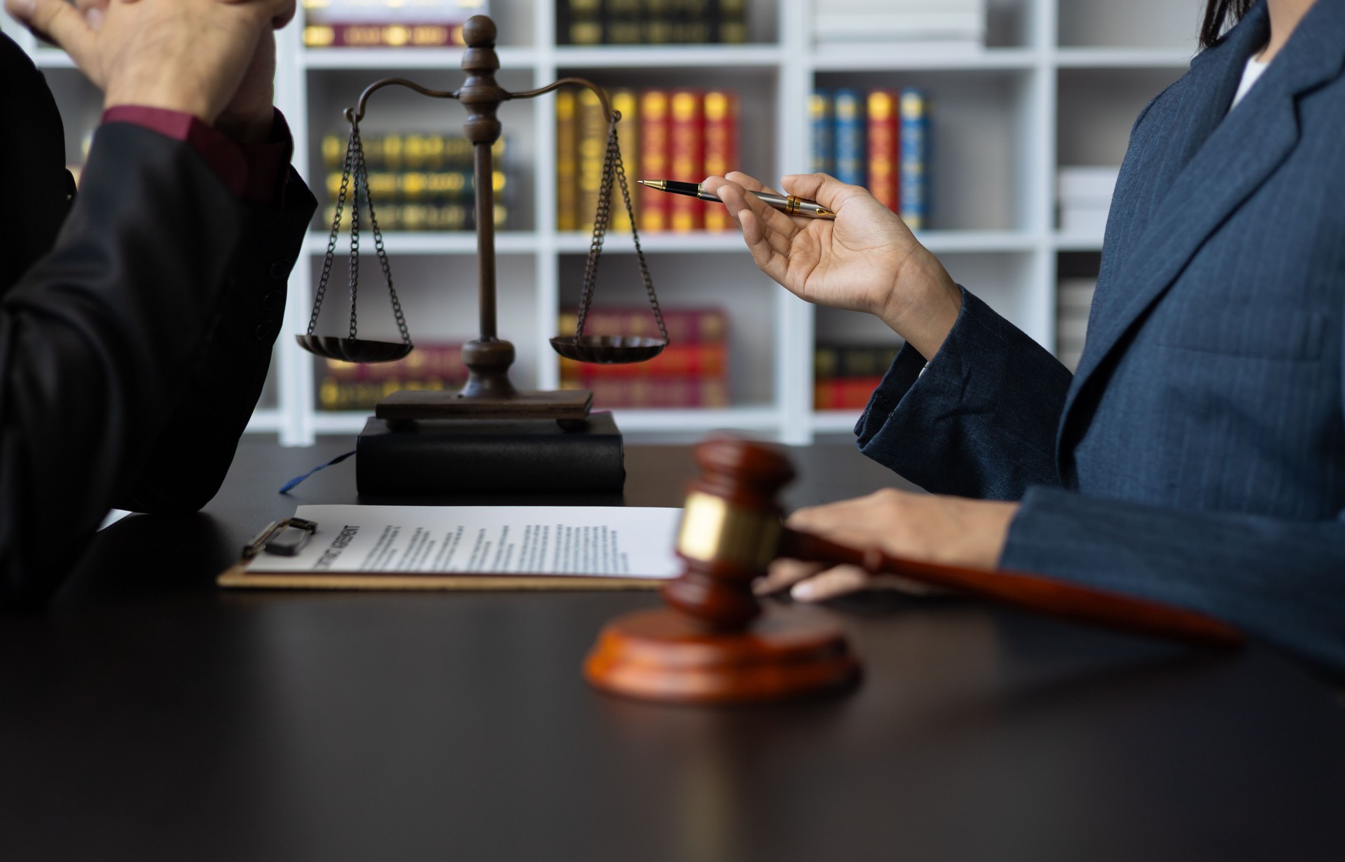 Businessman and lawyer discuss with legal advisor in lawyer's law office. Concept of legal and justice consulting services.